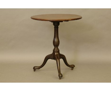 A George III mahogany tilt top tea table on tripod base, with a one piece top, 63cm diameter