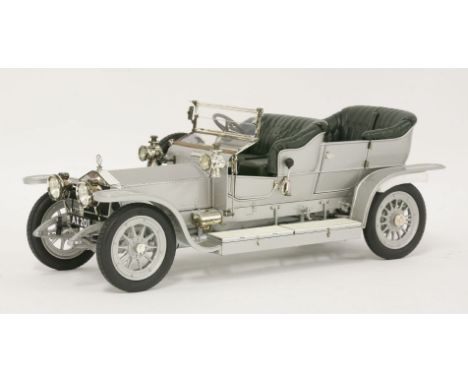 A Franklin Mint Connoisseurs Series, premier edition, ½ scale model, 1906 Rolls Royce Silver Ghost, featuring illuminating he