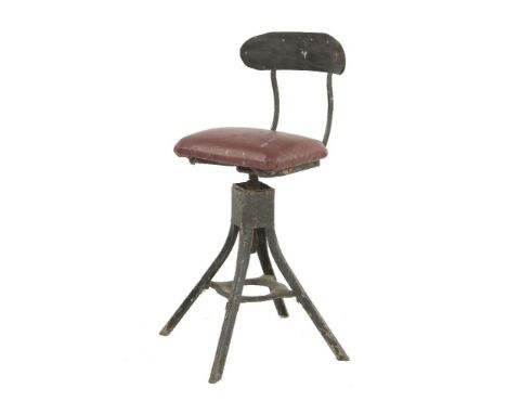 A metal stool,on a revolving stand