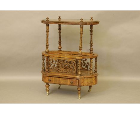 A Victorian walnut Canterbury with shelf superstructure, 73cm wide