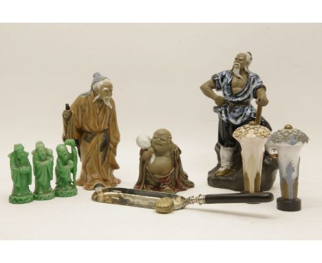 A Japanese trio of porcelain figures, three faux jade figures, two glass handled stamps, a crumb scoop, and a sovereign case 