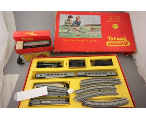 Boxed Triang OO gauge RX Transcontinental Series train set appearing complete plus a boxed Triang R58 Diesel B Unit TC Series