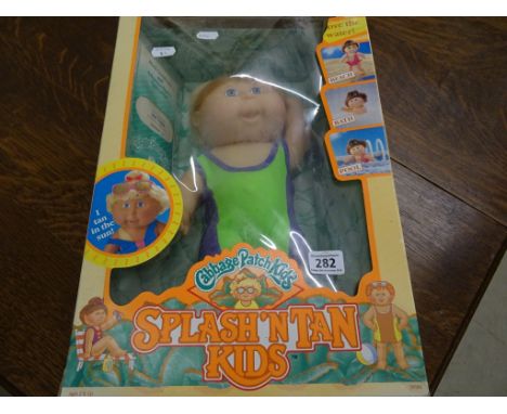 Original boxed Hasbro Garbage Patch Kids Splash n Tan doll 'Brad Vinson' with certificate
