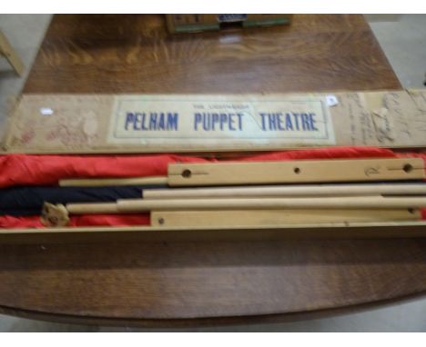 Boxed Pelham Puppet theatre appearing in good condition, box a little tatty 