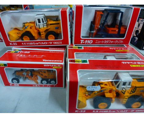 Eight boxed Japanese import Dinapet Diecast vehicles to include; T-88 Mitsubishi Motor grader Yonezawa 1/68 scale x 2, K-25 W