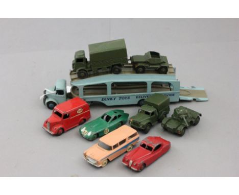 Nine vintage play worn Dinky vehicles to include 582 Pullmore Car Transporter, 163 Bristol 450, 173 Nash Rambler, ESSO Trojan