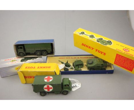 Three boxed Dinky military vehicles to include 622 10-Ton Army Truck, 697 25-Pounder Field Gun Set and 626 Ambulance in gener