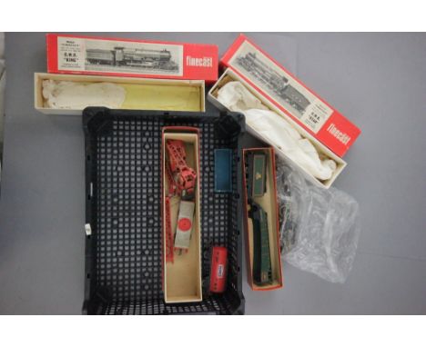 Three empty Wills Finecast metal locomotive boxes plus a part built engine, Hornby tender and two wagons