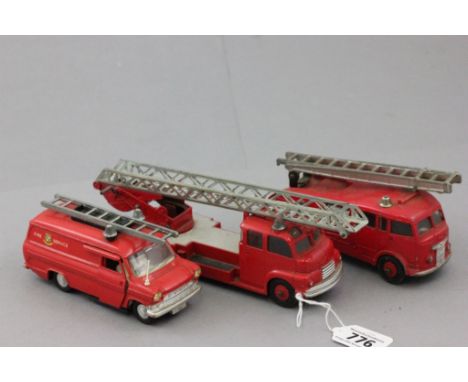 Three Dinky fire vehicles to include 955 fire engine (with windows and extending ladder), Ford Transit van and 956 turntable 
