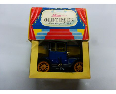 Boxed Schuco Old Timer 1227 Ford Coupe T/1917 tin plate car with key