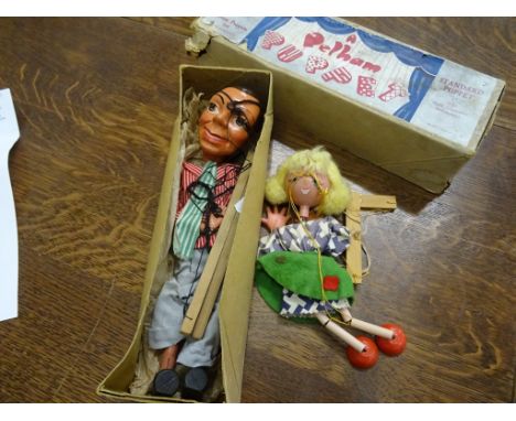 Boxed Archie Andrews Pelham Puppet in good condition with all limbs in tact plus another of a girl