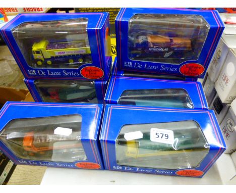 Seven boxed Exclusive First Editions 1/76 scale De Luxe Series Diecast vehicles, all advertising lorries