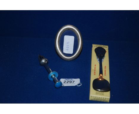 An Edwardian patent press button action Sugar Tongs of white metal with engine turned pale blue enamelled details, plus a Com