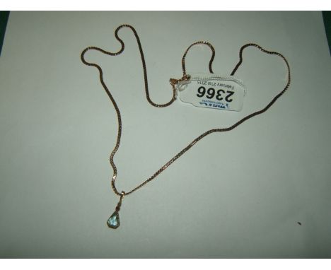 A fine 9ct Gold Chain with pretty diamond, ruby and aquamarine Pendant