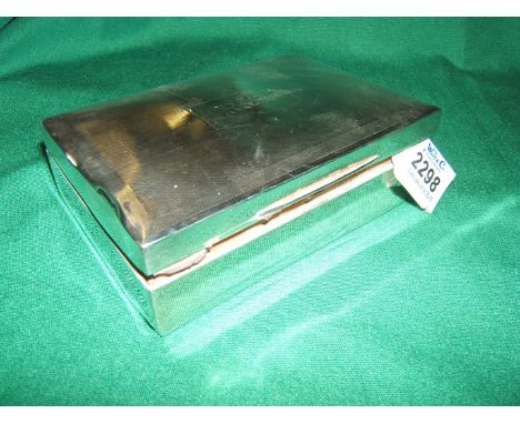 An engine turned Silver Cigarette Box, Birmingham 1936, engraved R & S 