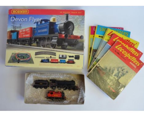 A boxed Hornby R1121 "Devon Flyer" OO guage train set with accessories, track, track mat etc. Also a used Tri-Ang R150 loco w