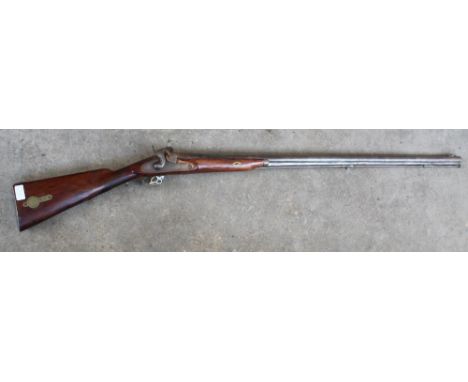 A percussion musket with patch compartment in but 