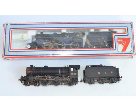 2 weathered OO gauge train models:A boxed Lima 2-6-0 205120 MWG BR Black Crab Loco "Super Detail".  Weathering added by previ