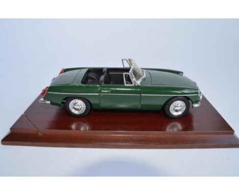 A boxed limited edition (1893/15000) 1/18 scale diecast Corgi 1963 MGB Roadster. 