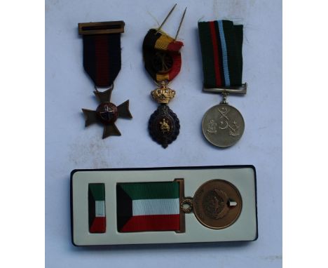 Collection of varied medals incl, nurses enamel medal, Belgium merit labour medal, Pakistan air force medal etc 