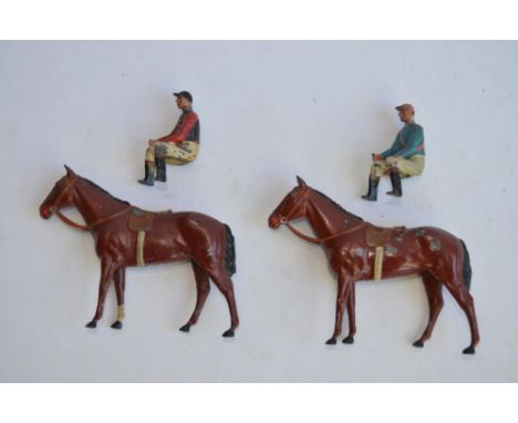 2 vintage Britains mounted jockey hollow lead figures with horses. 