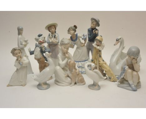 Another collection of Lladro, Nao and other figures including a swan