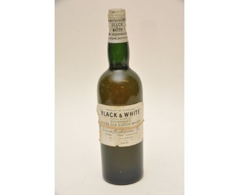 A bottle of Buchanans 'Black and White' Scotch whisky