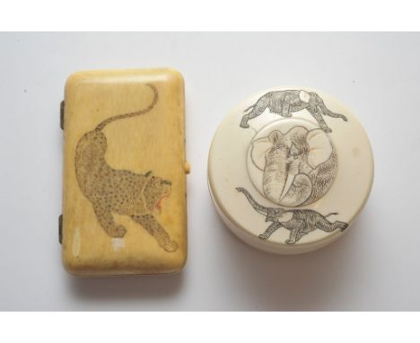 A Japanese ivory box and cover carved with elephants together with an ivory cigarette case carved with a lion