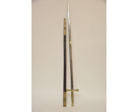 A ceremonial sword in scabbard with brass hilt, engraved blade by Spencer and Co, Queens St London 