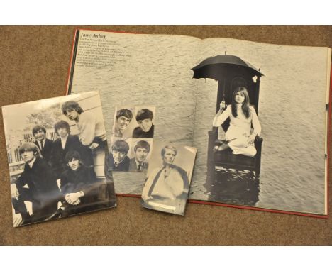 A book " Birds of Britain" a published photograph of the the Rolling Stones , A Beatles fan club photograph and Adam Faith 