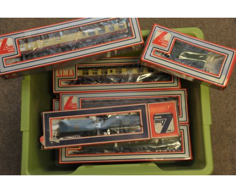 A collection of 9 boxed Lima model railway carriages, together with a boxed 'King Charles II' engine and a diesel engine.