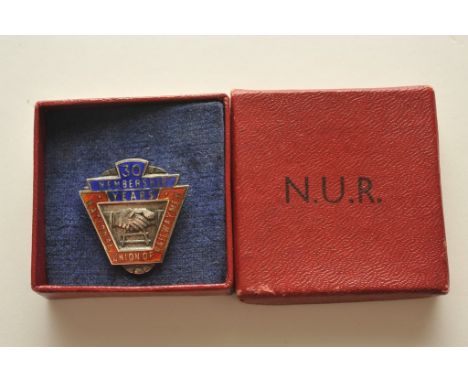 A boxed National Union of Railwaymen badge for 30 Years of Membership with enamel front and hallmarked silver to rear