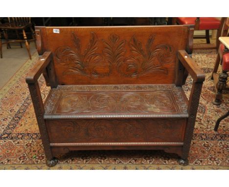 An oak carved monk's bench