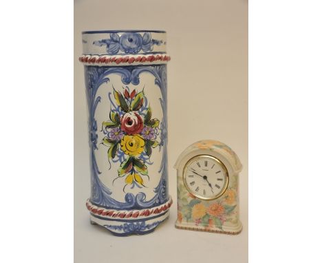 A Grayshott ceramic clock together with a continental ceramic stick stand
