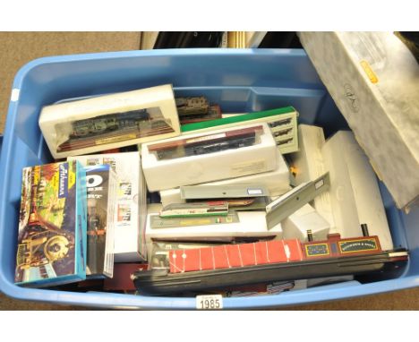 A box containing a large collection of railway interest items comprising various scale model locomotives on track and plinth 