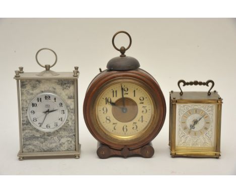 An early wooden cased alarm clock and two other modern clocks 