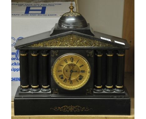 A large Classical style Victorian slate mantle clock with key