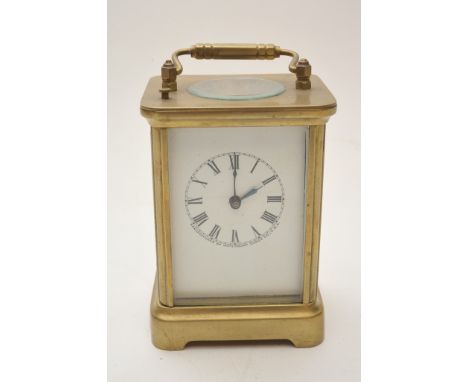An American brass carriage clock with alarm and repeat 