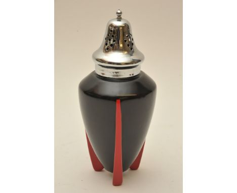 A further Art Deco Wilkinson 'Yoo Hoo' pattern sugar sifter with black body on red tripod feet having chrome lid, designed at