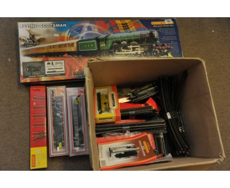 A boxed electric Flying Scotsman train set with a quantity of boxed Lima and Hornby 00 gauge carriages and track