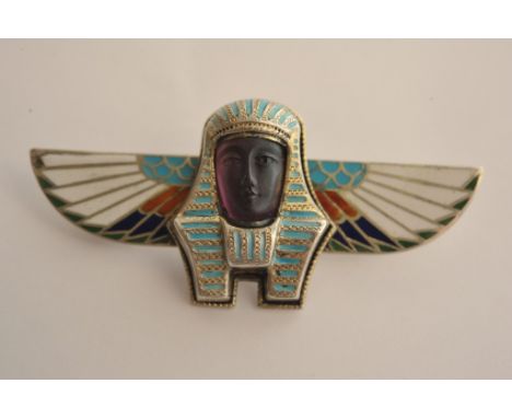 A quality 1920s continental silver 800 enamel of Egyptian influence with winged ends and amethyst coloured centre, the revers