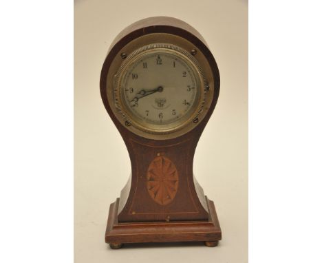 A small Edwardian inlaid mantle clock