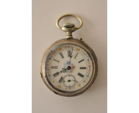 A continental white metal button wind pocket watch with a decorative enamel dial 