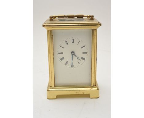 A brass cased carriage clock 
