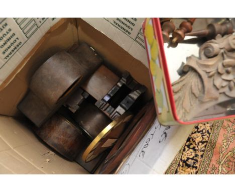 A box containing a collection of mantle clock cases
