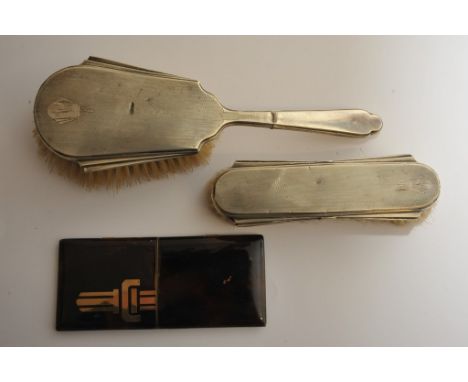 A silver backed hairbrush and mirror and an Art Deco twin compact and cigarette case
