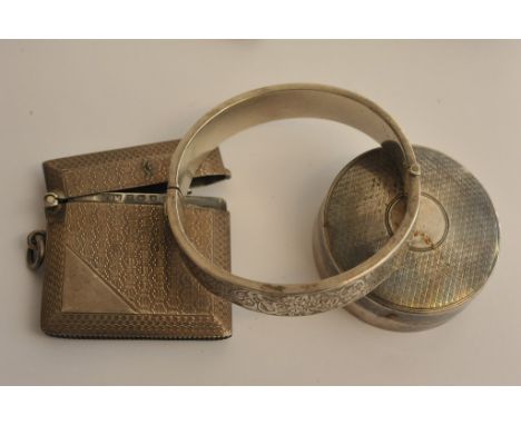 A silver vesta case of square form together with a silver bangle and a circular silver box