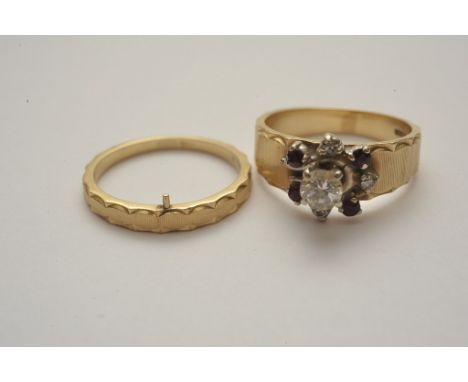 A pair of gold rings comprising 14ct gold ring set with central diamond with diamond and ruby surround and a band ring with l