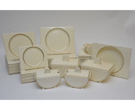 A Clarice Cliff 'Biarritz' shape part dinner service of innovative square shape having green and gold band and spot decoratio