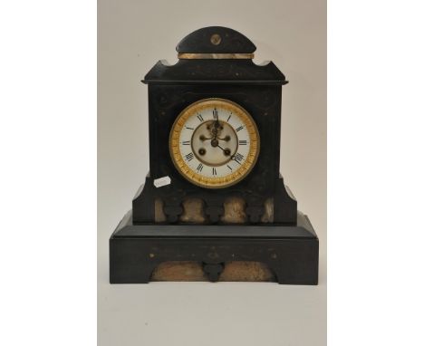 A Victorian black slate and marble clock with enamel dial and pendulum